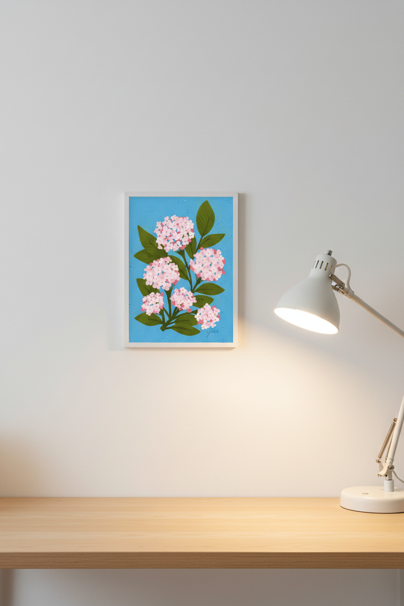 Hydrangea Bloom print framed next to a desk lamp