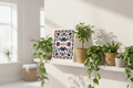 Hope in Bloom print displayed with houseplants