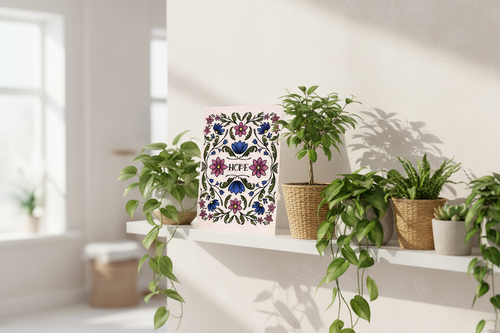 Hope in Bloom print displayed with houseplants